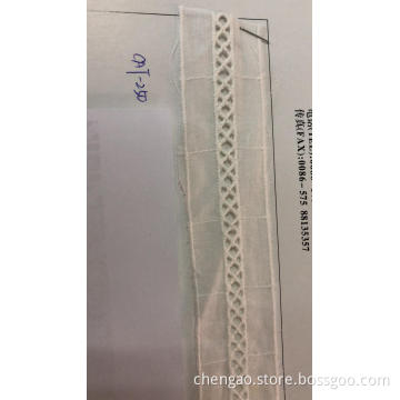 Pinhole Trims bomullsbroderityg